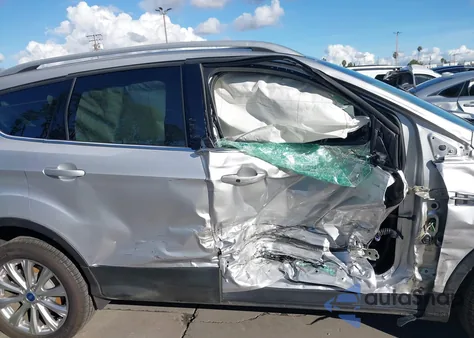 2017 Ford Escape Titanium from USA, damaged, VIN 1FMCU0J9XHUD85355